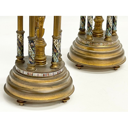 51 - A pair of late 19th century French brass dome garnitures with Egyptian revival figures, enamel decor... 