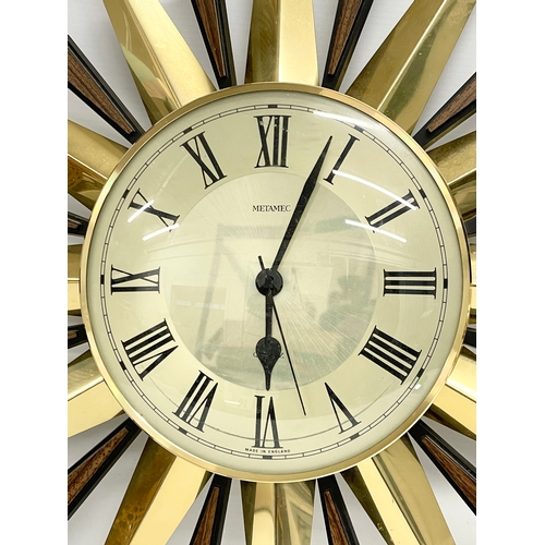 55 - A Mid Century ‘Sunburst’ wall clock. Metamec. 60cm