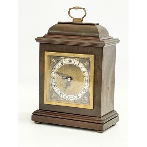 56 - An Elliot London brass face mantle clock by Garrard & Co. 15.5x8.5x23cm