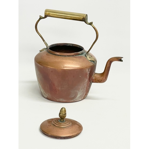 131 - 3 large Victorian copper kettles. Largest 33x31x33cm. 18x19x25cm. 26x12x21cm