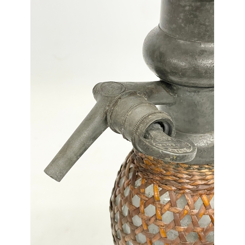 134 - A large late 19th century Gasogene Seltzer Dispenser by Briet. 47cm