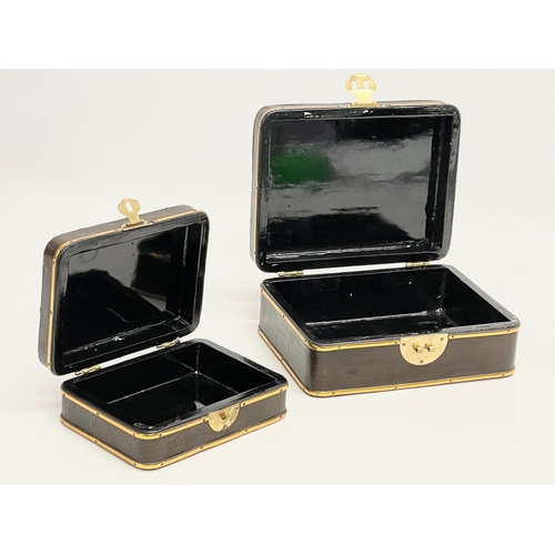 136 - A pair of early 20th century hand painted, brass bound lacquered boxes. 18x15x7cm