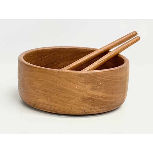 137 - A Mid Century teak salad bowl with utensils. 1960-1970. 25.5x10.5cm