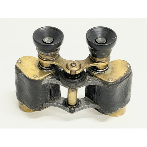 263 - A pair of early 20th century Reynolds & Branson LTD field binoculars. WW1.