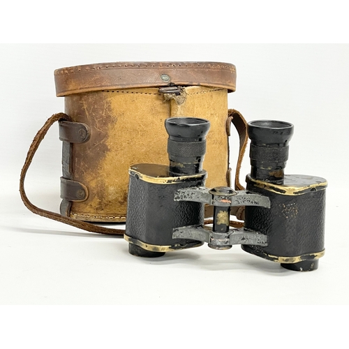 264 - A pair of early 20th century field binoculars. WW1.