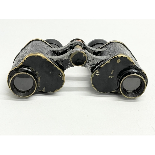 264 - A pair of early 20th century field binoculars. WW1.