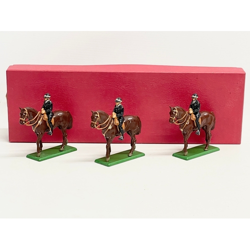 332 - 3 Britains hand painted metal models. Mounted policemen.