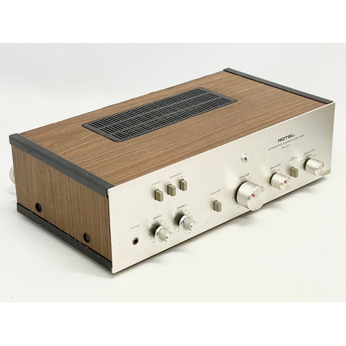 335 - A vintage Rotel Integrated Stereo Amplifier. Model RA-214.