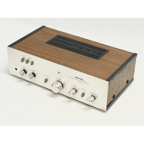 335 - A vintage Rotel Integrated Stereo Amplifier. Model RA-214.