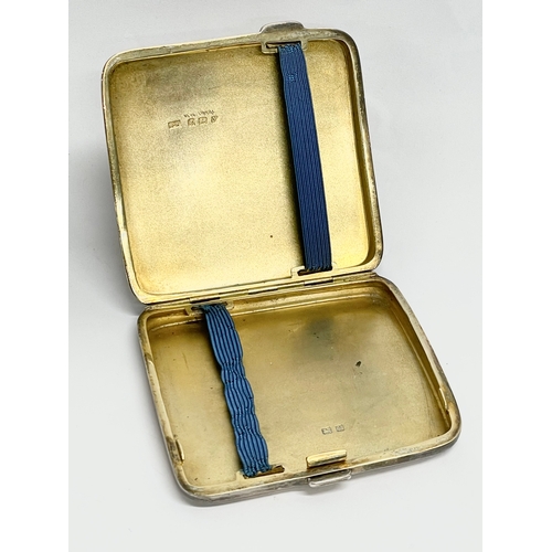 404 - A silver gold plated cigarette case. Birmingham 1923. 123 grams.