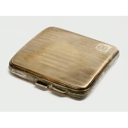 404 - A silver gold plated cigarette case. Birmingham 1923. 123 grams.