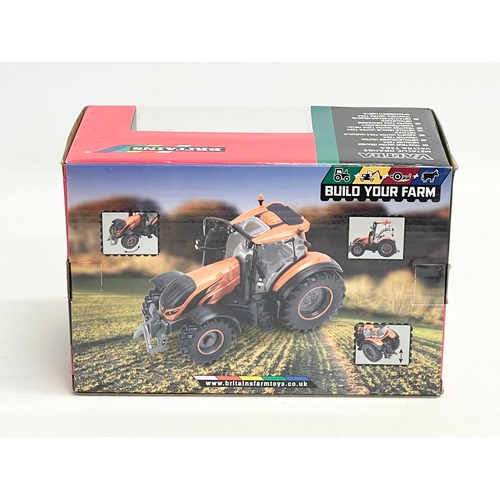 349 - An unused Britains Valtra Metallic Orange Valtra TZ54 Tractor in box. 1:32 scale. Die Cast Model and... 