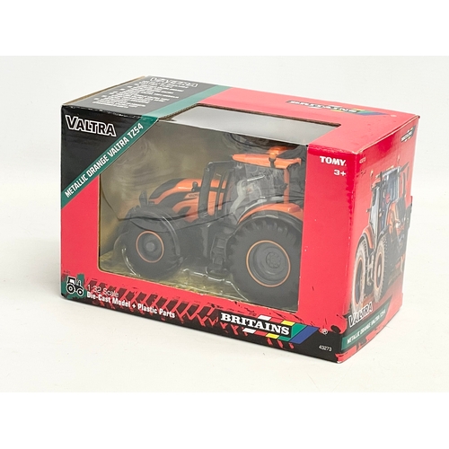 349 - An unused Britains Valtra Metallic Orange Valtra TZ54 Tractor in box. 1:32 scale. Die Cast Model and... 