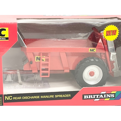 350 - An unused Britains NC Engineering NC Discharge Manure Spreader in box. 1:32 scale. 25x12x14cm