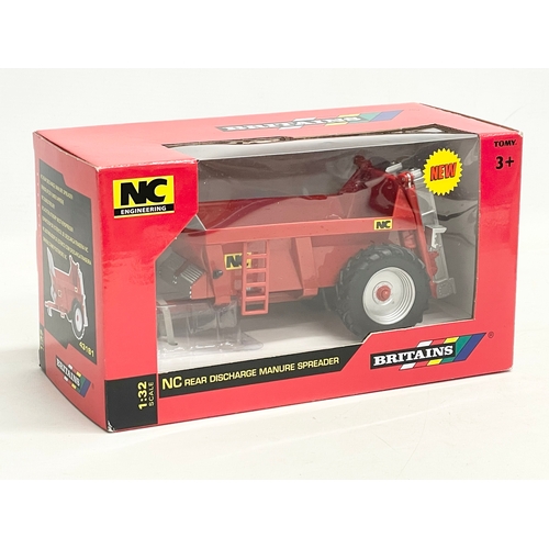 350 - An unused Britains NC Engineering NC Discharge Manure Spreader in box. 1:32 scale. 25x12x14cm