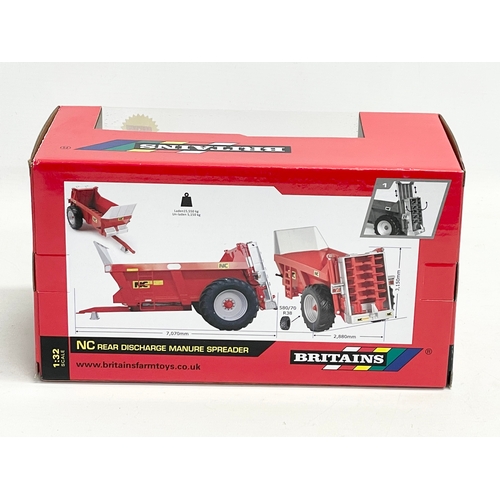 350 - An unused Britains NC Engineering NC Discharge Manure Spreader in box. 1:32 scale. 25x12x14cm