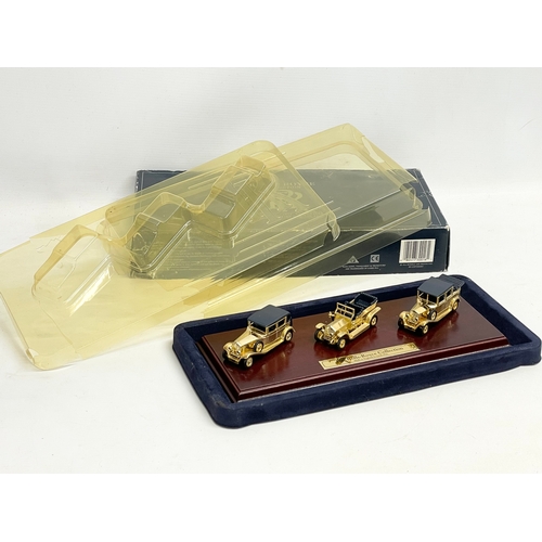 386 - The Rolls-Royce Collection. A Limited Edition Special 24 carat Gold Plated Rolls Royce models on sta... 