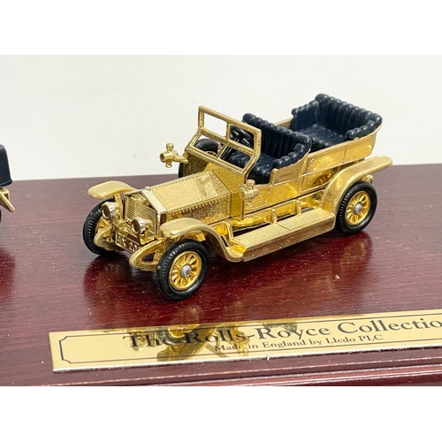 386 - The Rolls-Royce Collection. A Limited Edition Special 24 carat Gold Plated Rolls Royce models on sta... 