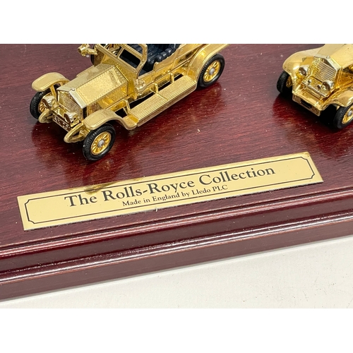 386 - The Rolls-Royce Collection. A Limited Edition Special 24 carat Gold Plated Rolls Royce models on sta... 