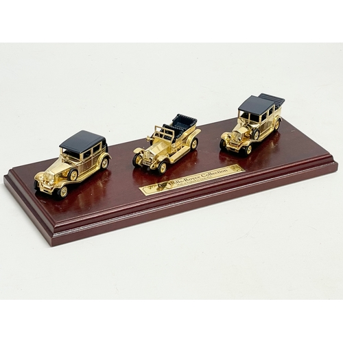 386 - The Rolls-Royce Collection. A Limited Edition Special 24 carat Gold Plated Rolls Royce models on sta... 