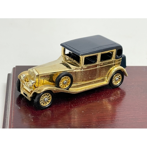 386 - The Rolls-Royce Collection. A Limited Edition Special 24 carat Gold Plated Rolls Royce models on sta... 