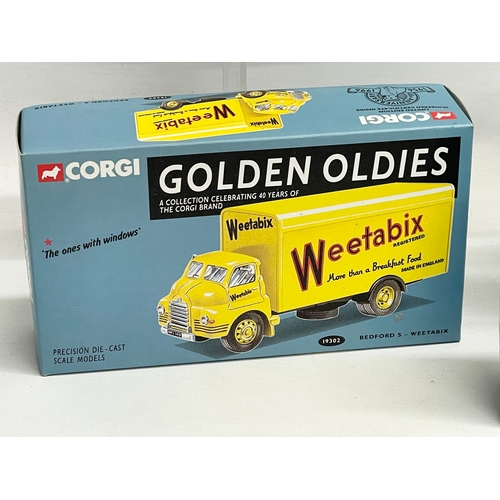 390 - 4 boxes of Corgi models.