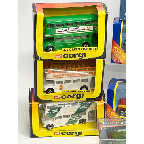 518 - A collection of Corgi models in boxes.