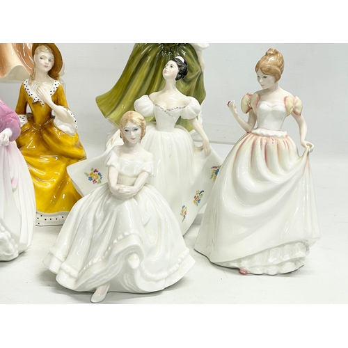 256 - 9 Royal Doulton and Coalport figurines. 21cm. 7 Royal Doulton, Ninette HN2379. Ashley HN3420. Sandra... 