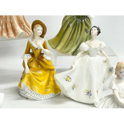 256 - 9 Royal Doulton and Coalport figurines. 21cm. 7 Royal Doulton, Ninette HN2379. Ashley HN3420. Sandra... 