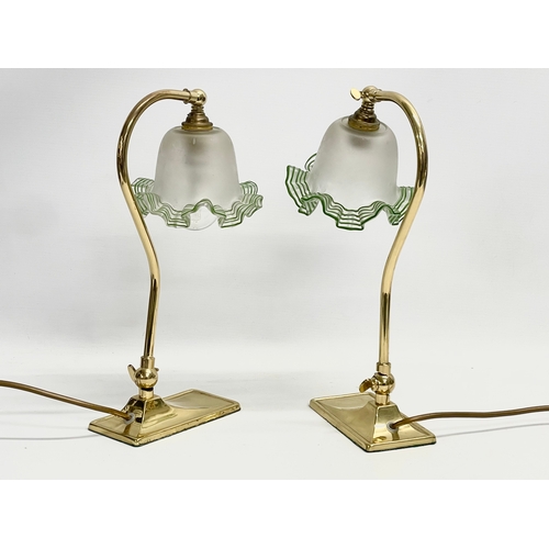 82 - A pair of good quality Christopher Wray brass swan neck adjustable table lamps with frilled glass sh... 