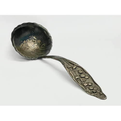 406 - An ornate late 19th century Sterling Silver  ladle. 69 grams.