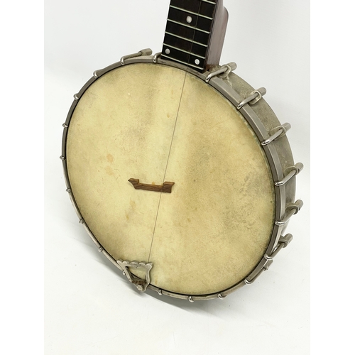 365 - A Fred Langham banjo with case. Banjo measures 90cm.