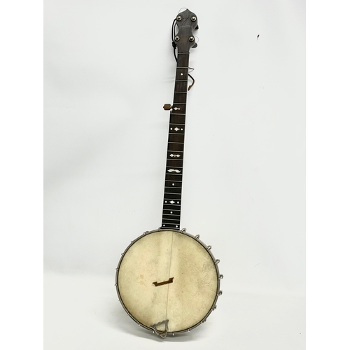 365 - A Fred Langham banjo with case. Banjo measures 90cm.