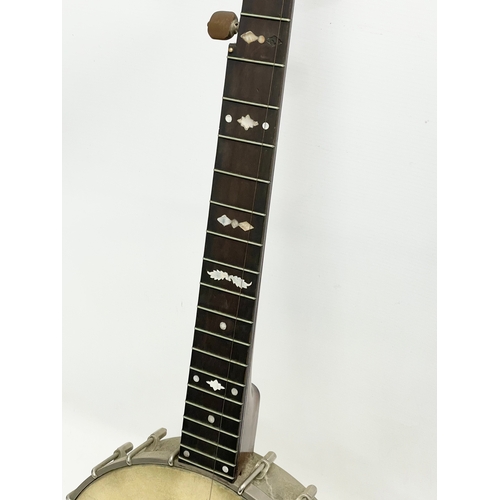 365 - A Fred Langham banjo with case. Banjo measures 90cm.