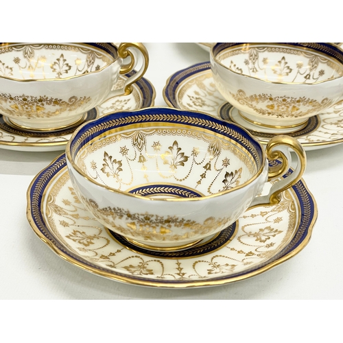 85 - A fine 40 piece Cauldon LTD gilt and cobalt blue tea service. Early 20th century. 1905-1920.