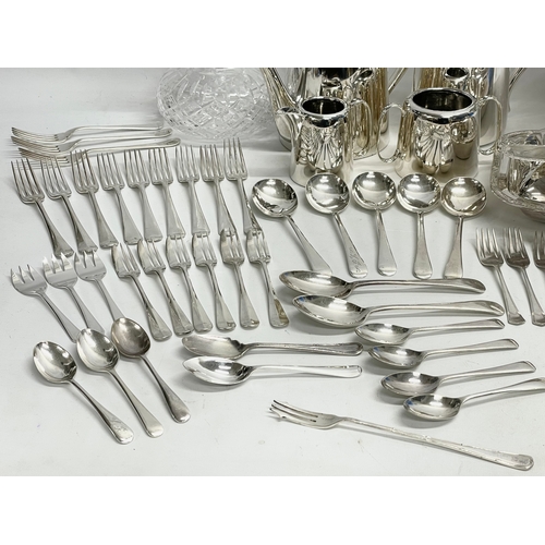 245 - A collection of good quality plated cutlery. 4 piece plated hotel ware set. Crystal decanter (stoppe... 