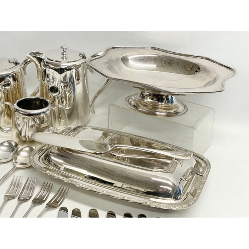 245 - A collection of good quality plated cutlery. 4 piece plated hotel ware set. Crystal decanter (stoppe... 