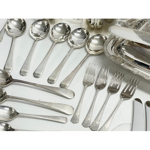 245 - A collection of good quality plated cutlery. 4 piece plated hotel ware set. Crystal decanter (stoppe... 