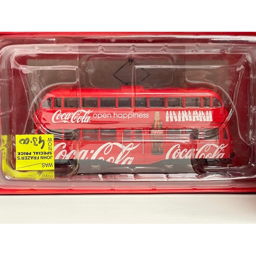 524 - 2 Corgi Coca Cola models in boxes. Coca-Cola Double Decker Tram, 1:76 die cast model. Coca-Cola Sing... 