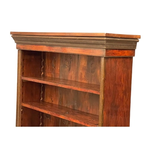 1017 - A Victorian mahogany open bookcase with adjustable shelves. 102x29x117cm (3)