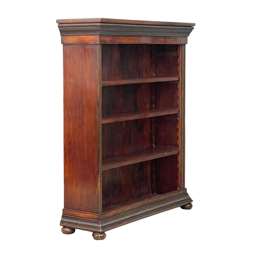 1017 - A Victorian mahogany open bookcase with adjustable shelves. 102x29x117cm (3)