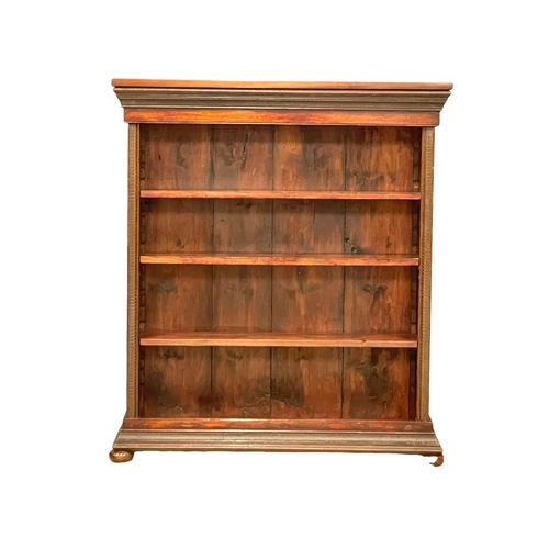 1017 - A Victorian mahogany open bookcase with adjustable shelves. 102x29x117cm (3)