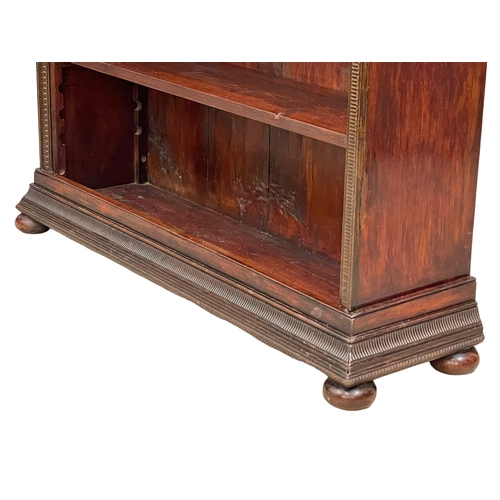 1017 - A Victorian mahogany open bookcase with adjustable shelves. 102x29x117cm (3)