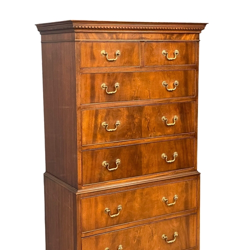 1020 - A vintage Georgian style tallboy chest of drawers on splayed feet. 81x47.5x166cm. (9)