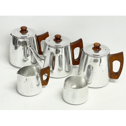 239 - A Mid Century stainless and teak tea service.