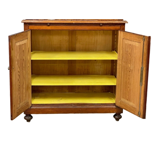 1023 - A large Victorian pitch pine kitchen dresser with brushing slide and glazed doors. 109x47x228cm (4)