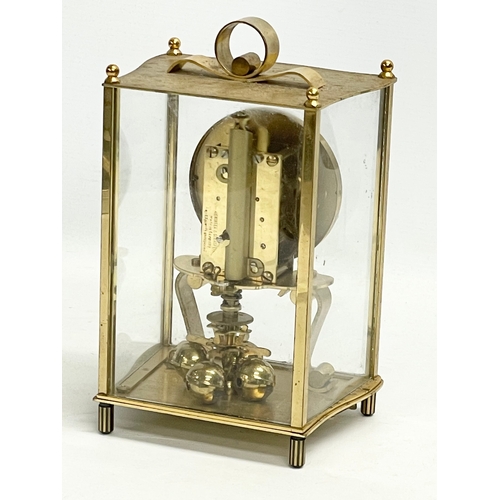 237 - A brass mantle clock with etched bevelled glass panels. Kundo, Kieninger & Obergfell. West Germany. ... 