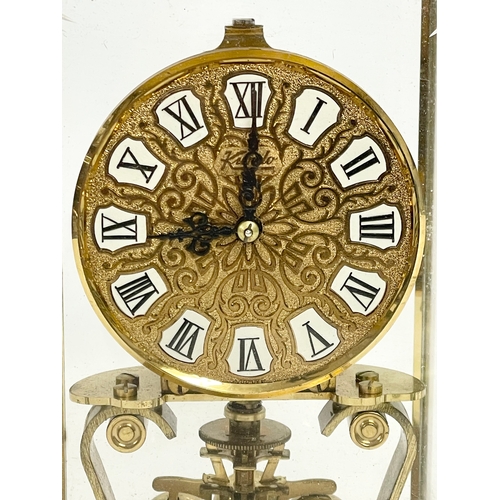 237 - A brass mantle clock with etched bevelled glass panels. Kundo, Kieninger & Obergfell. West Germany. ... 