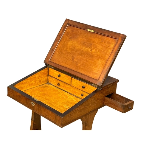 1040 - A William IV rosewood Davenport desk with leather top and maple interior. Circa 1830. 53.5x55x76.5cm... 