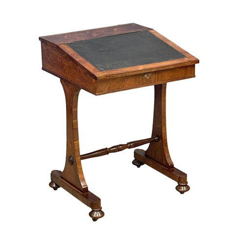 1040 - A William IV rosewood Davenport desk with leather top and maple interior. Circa 1830. 53.5x55x76.5cm... 